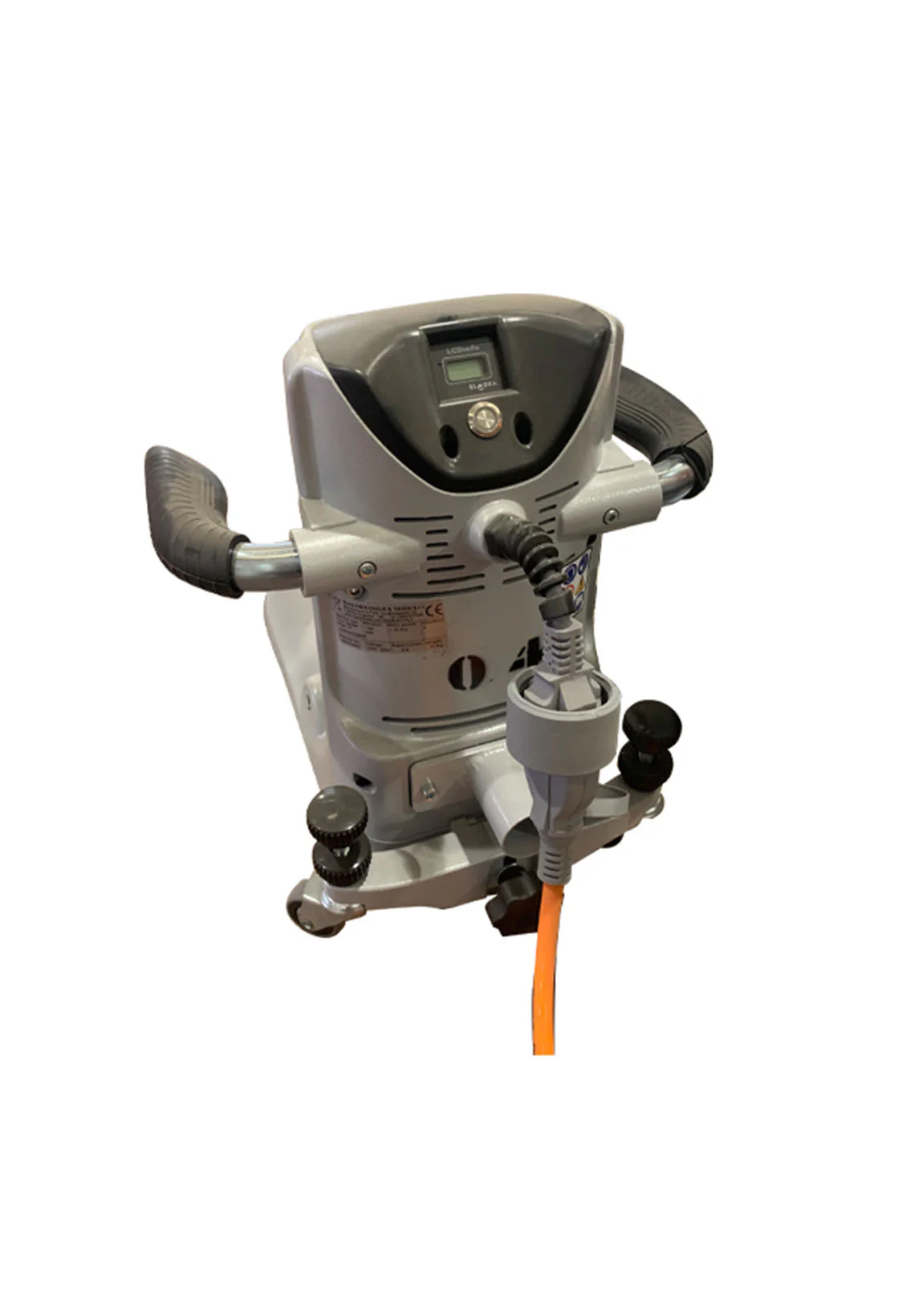 Medical treatment device with dual handles and a small digital screen, connected to an orange cable.